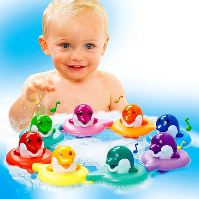 Tomy Toomies Do Re Mi Dolphins Bath Toy