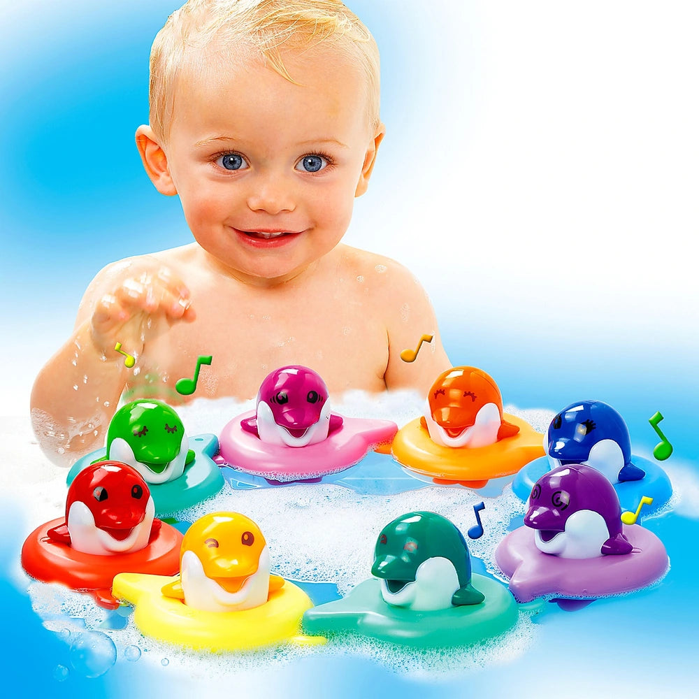 Tomy Toomies Do Re Mi Dolphins Bath Toy