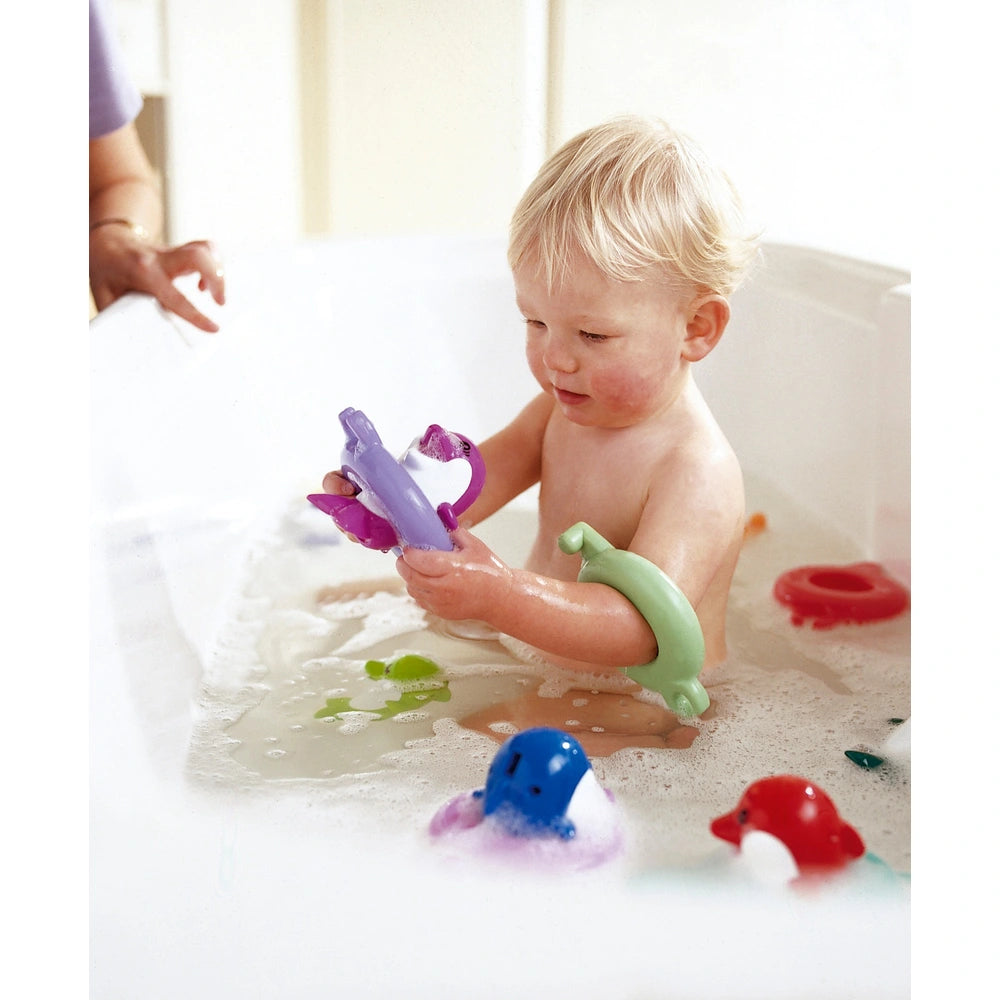Tomy Toomies Do Re Mi Dolphins Bath Toy